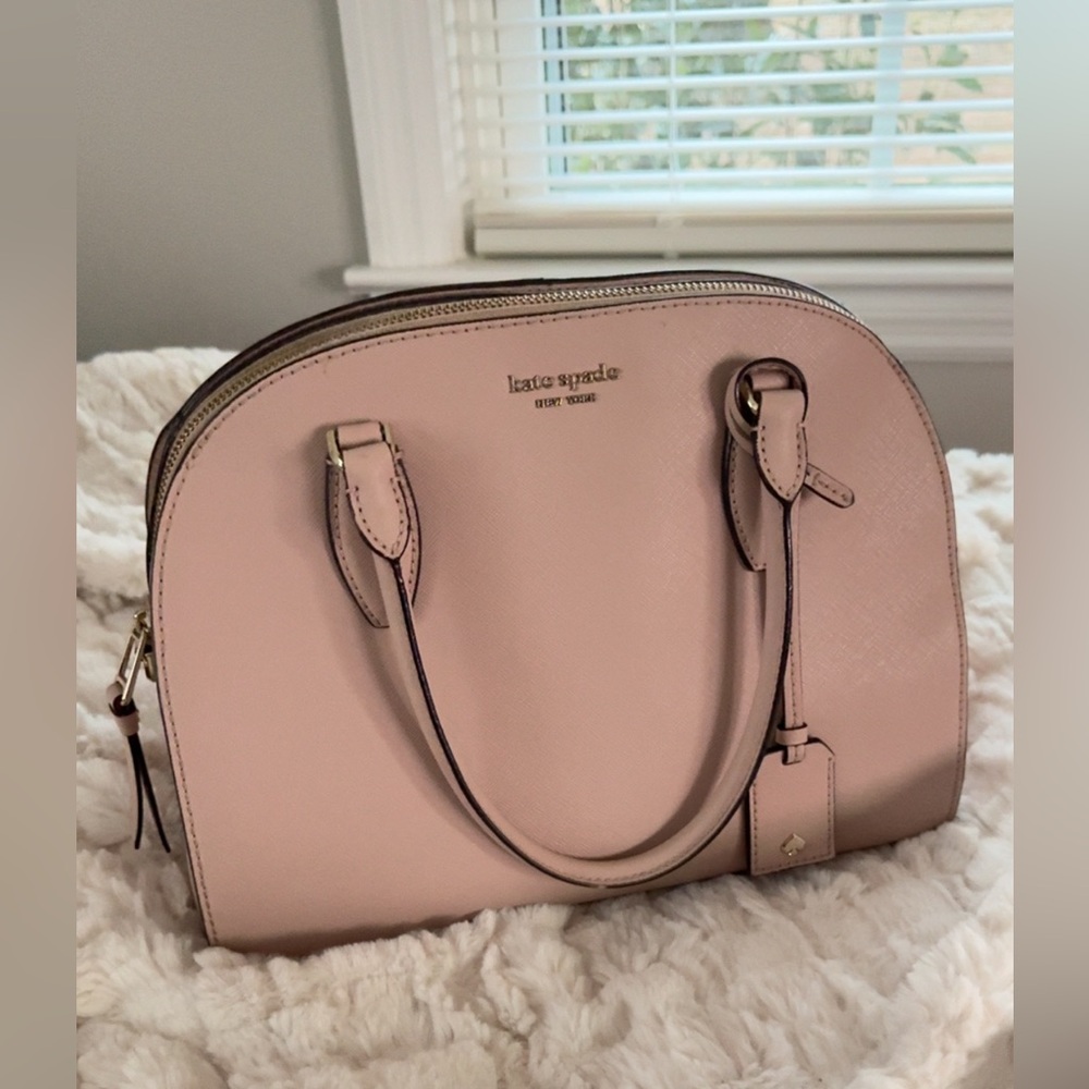 Kate Spade Purse.
Color  - (pale pink)
Used  - (mediumCondition)
Size - (Medium)
